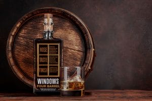 Whiskey image with barrel in the background